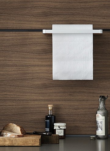 Elegant kitchen roll holder mounted to the panel wall