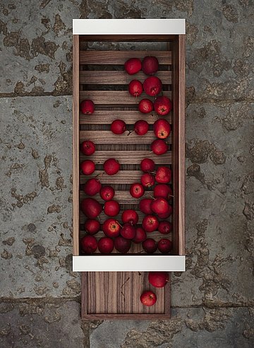 Wood container with grid, pull-out base, and lateral metal edge handles for storing fruit and vegetables